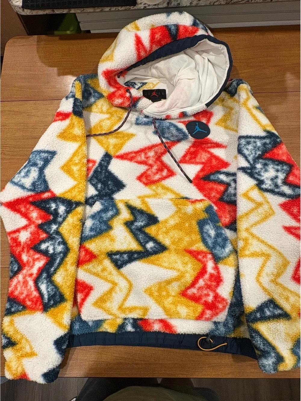 Jordan Fleece Pullover Hoodie with Colorful Geometric Pattern